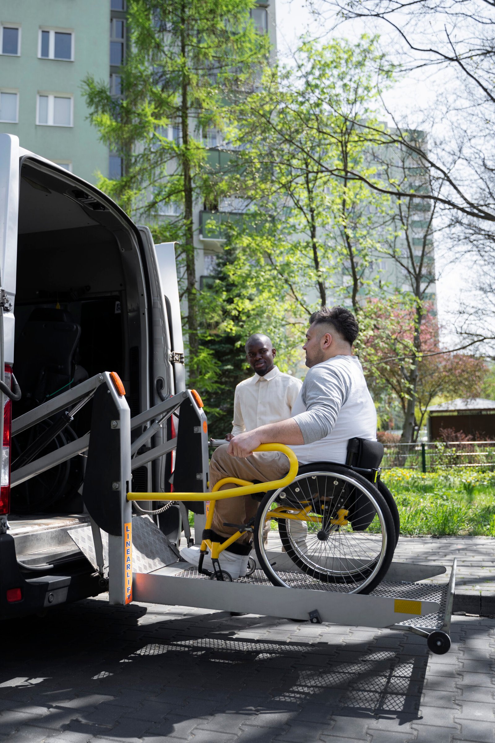 full-shot-disabled-man-getting-van